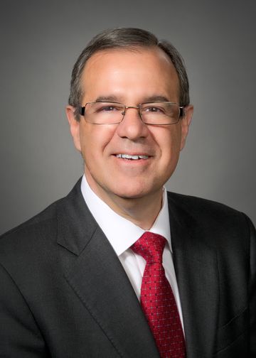 Mark Solazzo wearing a red tie